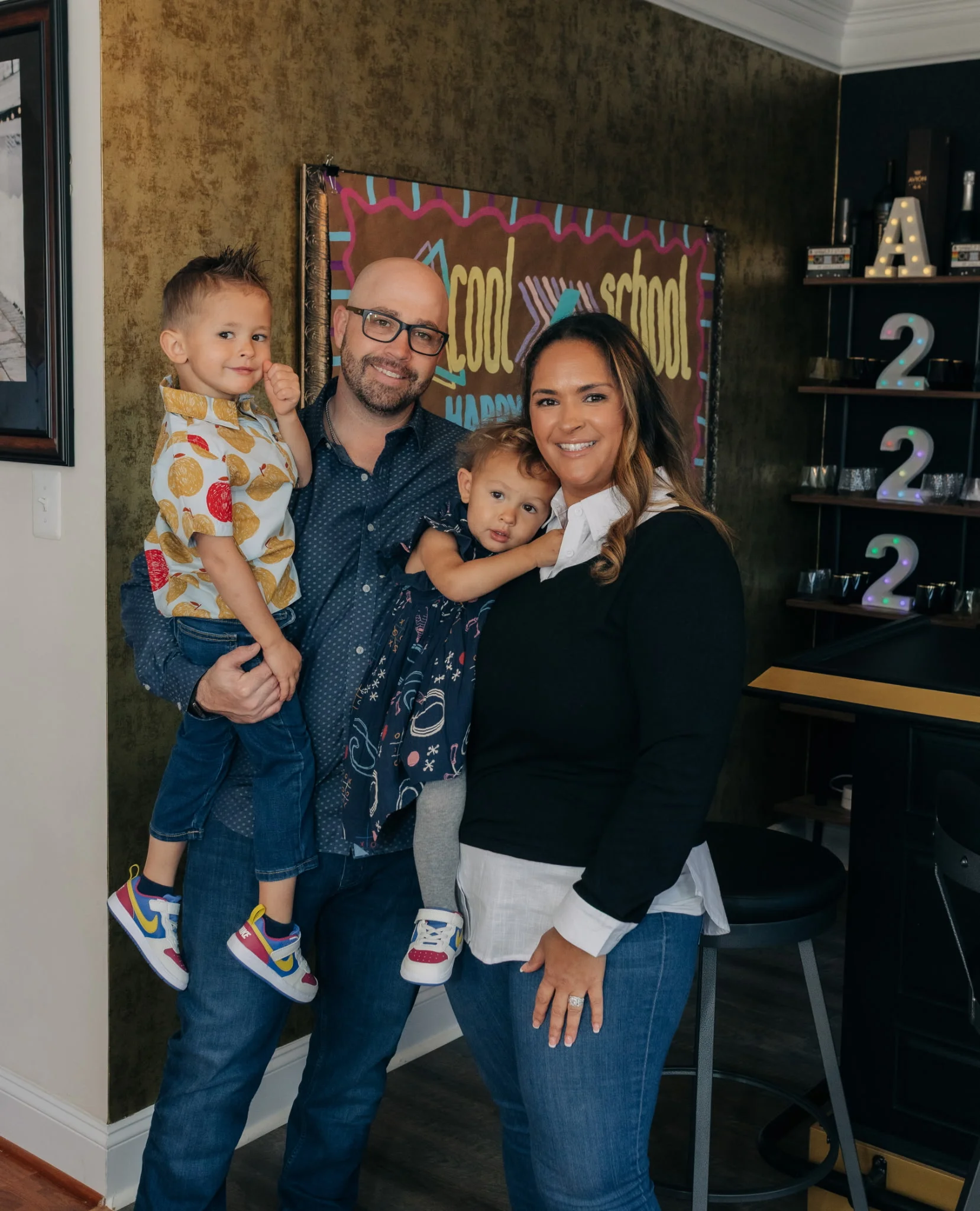 Tom Kennedy, Jennifer Hill, and their children